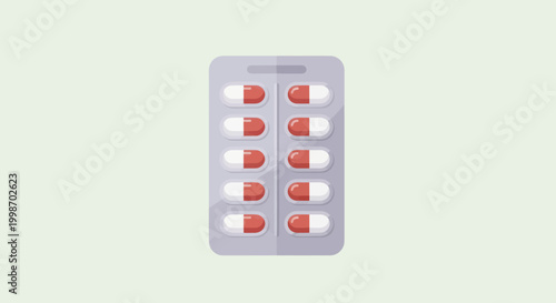 Blister pack of red and white capsules for medical treatment.