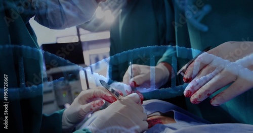 Operating gloved surgeons in green gowns manipulating draped torso in OR with scalpel, forceps, DNA