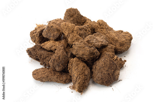 Obraz na płótnie A pile of brownish-black peat soil