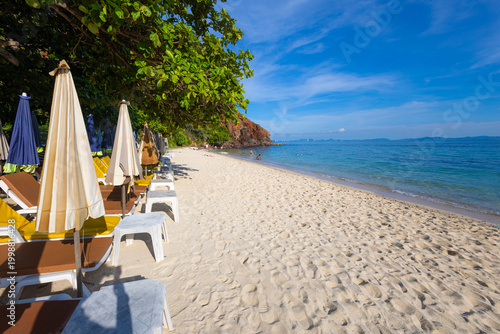 Tableau sur toile Beach chair umblella on white sand sea beach