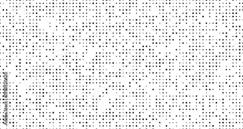 Black dots scattered on a white background pattern