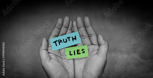 Hands holding truth and lies message, honesty versus deception, moral dilemma, trust and integrity