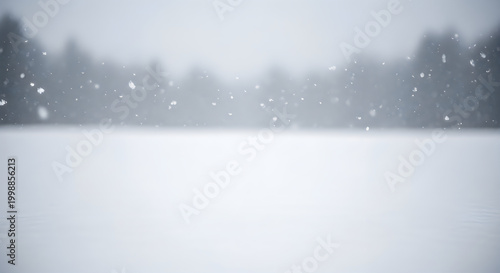 Snowfall scene with falling snowflakes and blurred forest background illustration
