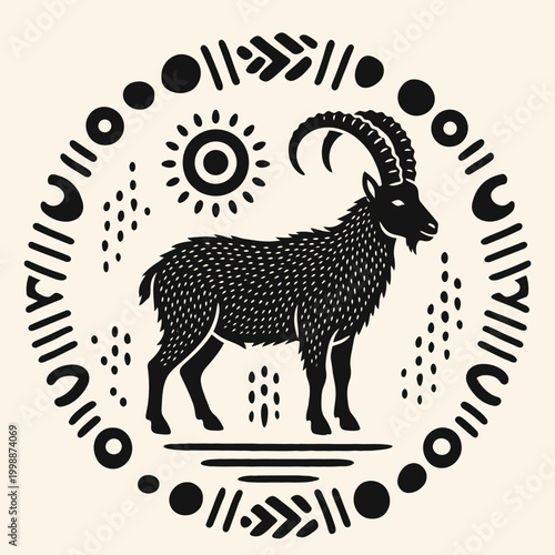 Black goat with curved horns standing.