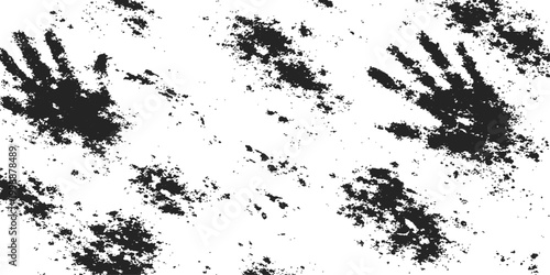 Dark handprints with expressive details is printed on a textured surface of unknown material, which evoke a sense of mystery and intrigue.