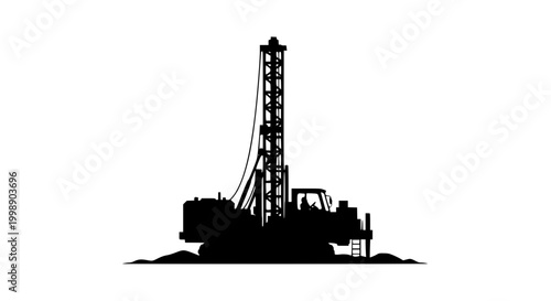Black silhouette of a heavy industrial drilling rig isolated on white background
