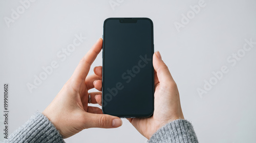 Hands holding smartphone blank screen mobile phone close up device technology person touchscreen copy space vertical