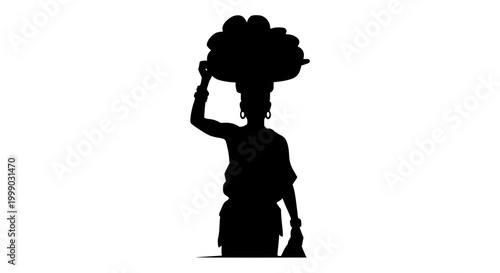 Silhouette of African Woman Carrying a Basket on her Head