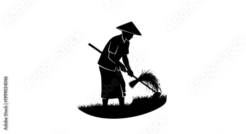 Silhouette of a traditional Asian farmer working in a field