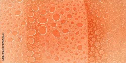 Intricate condensation on a warm-toned surface, forming captivating circular patterns, creating an abstract and textured visual.