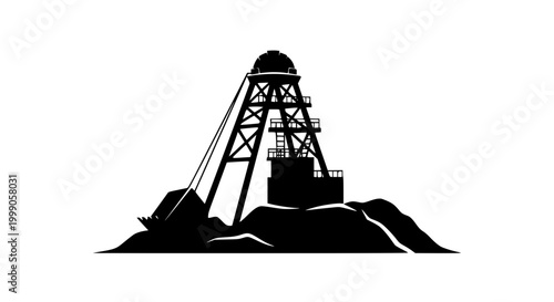 Silhouette of a mining headframe and excavator bucket on a rock pile