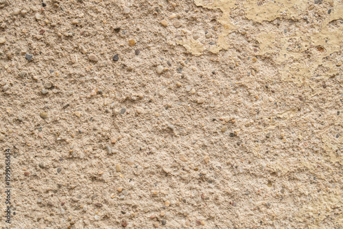 Helle Sand- und Putztextur – natürliche Wandoberfläche mit feiner Körnung