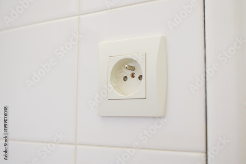 Tableau sur toile Prise éléctrique salle de bain