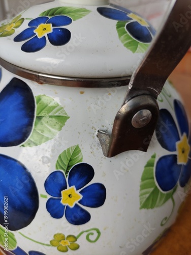 Enamel painted kettle from other side, visible stains and signs of long-term use