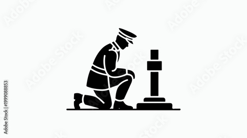 Silhouette of soldier kneeling by a grave as a tribute to fallen heroes