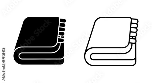 Black and white folded towel icons in different styles on a pure