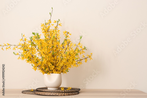 Blossoming branches in vase...