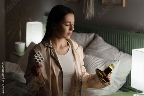 Young woman with melatonin ...