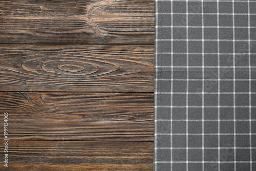 Checkered napkin on wooden ...