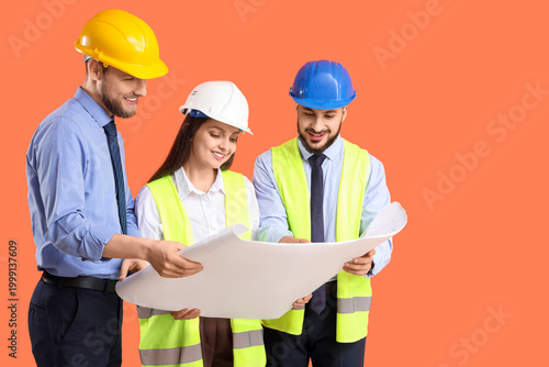 Group of engineers with hou...
