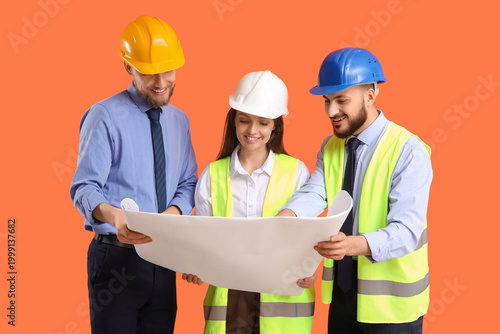 Group of engineers with hou...