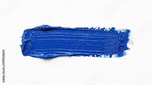 Vibrant blue paint stroke texture on white background for creative design
