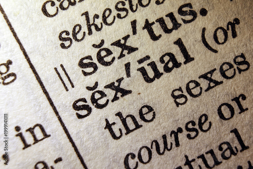 Bild auf Leinwand Word sexual on dictionary page, macro close up