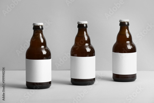 Bottles of cold beer on gre...