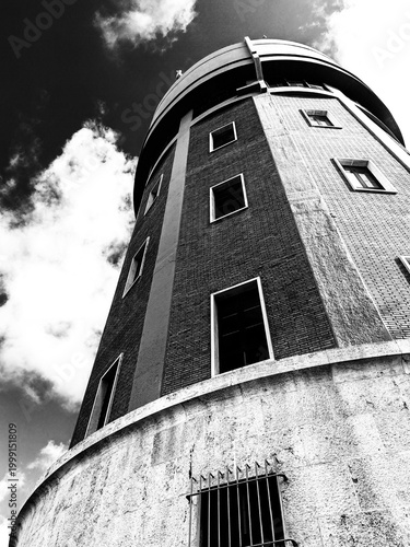 Ostia, Rome, Italy - October 20, 2025, perspective detail of the Acea Tower in Ostia, with the sign of the Ostia Batteria Alto water center, owned by Acea S.p.A.