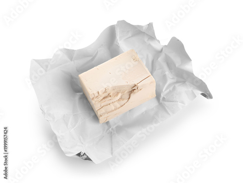 Pack of fresh yeast on whit...
