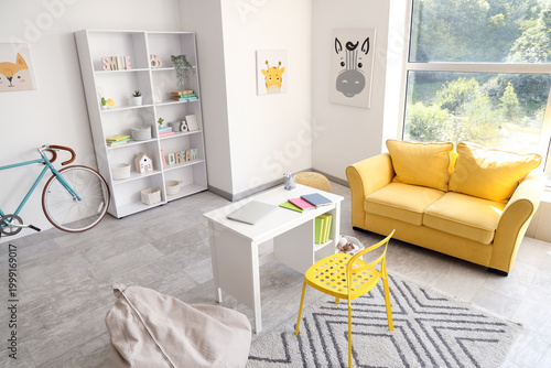 Interior of room with child...