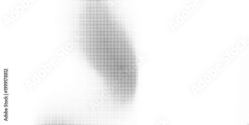 Halftone dot pattern with black and white gradient creates an abstract background graphic.