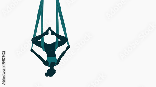 A silhouette of a woman engaged in aerial yoga, suspended gracefully, embodies serenity and strength in a minimalist studio.