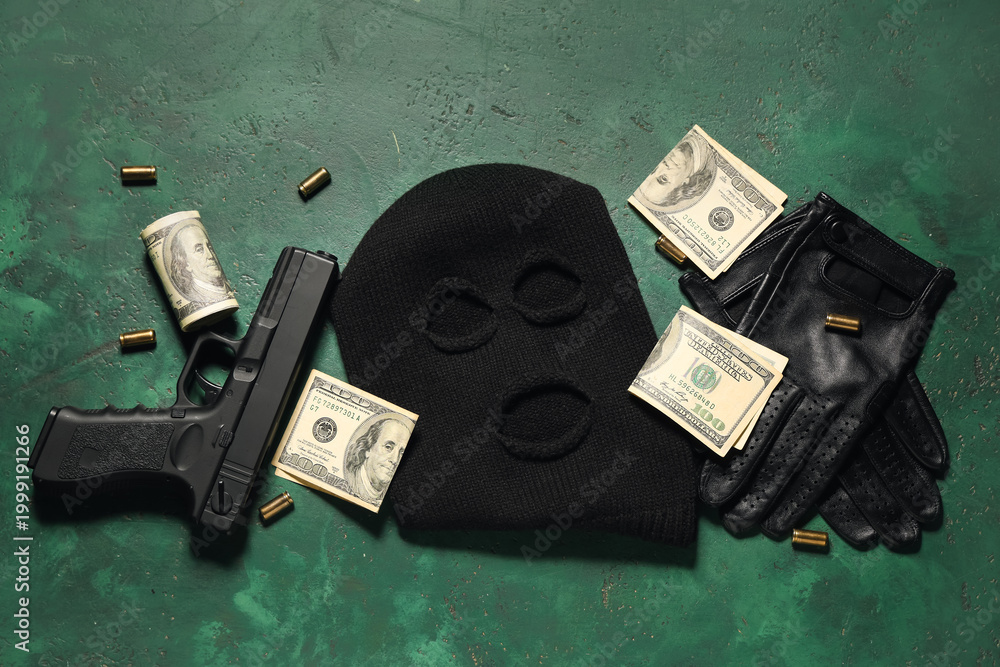 Ταπετσαρία Balaclava with gun, gloves, bullets and money on green grunge background