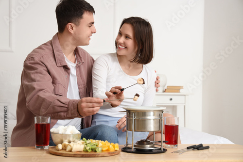 Young happy couple with gla...