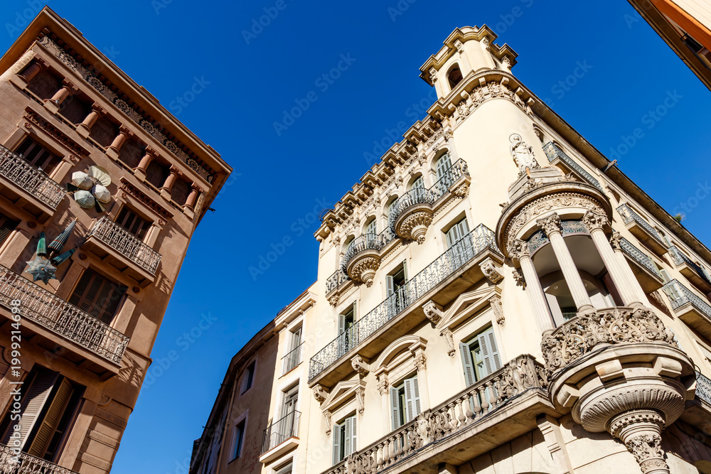 Fototapeta premium Facade of an Art Nouveau and a Neo Classical building at the Ramblas in Barcelona, Catalonia, Spain, Europe
