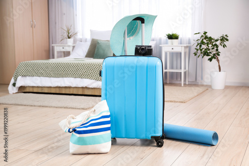Packed suitcase with camera...