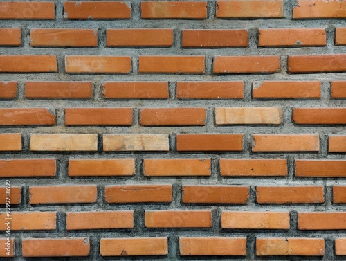 detailed frontal view of a rustic, weathered red brick wall. clear seamless texture pattern of traditional clay bricks and mortar, perfect for background design and architecture concepts.