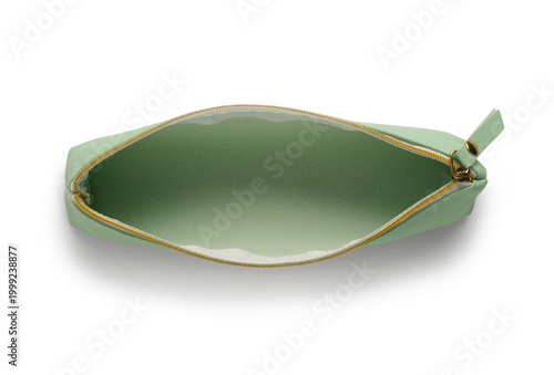 Фотография Open green pencil case on white background