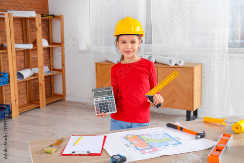 Little architect with calcu...