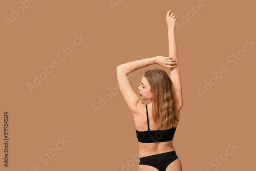 Sexy young woman in black c...