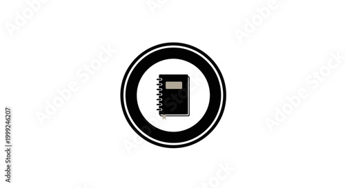 Black notebook with spiral binding.