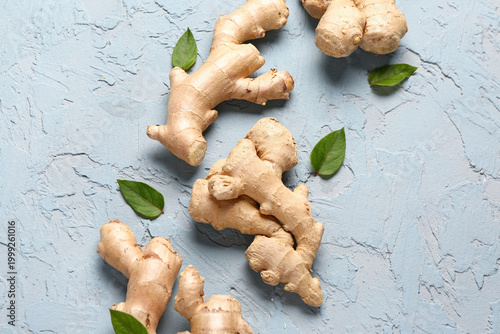 Fresh ginger roots and leav...