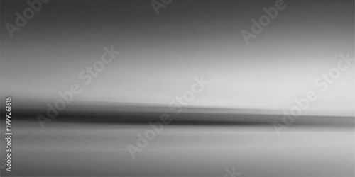 Abstract monochrome landscape captures a minimalist scene of blurred forms, lines, and textures. evokes a sense of calm and contemplative feeling.