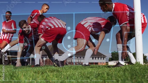 Teen soccer team jogging pitch, shifting into crouch with blue HUD appearing sparking sprint drill