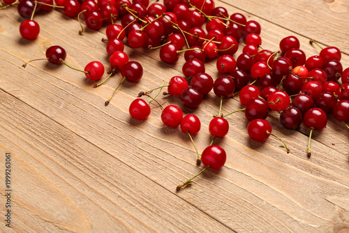Many red sweet cherries on ...