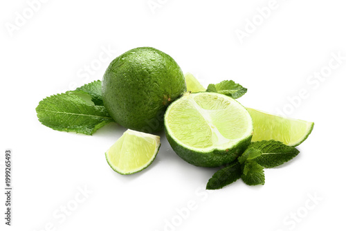 Ripe limes with fresh mint ...