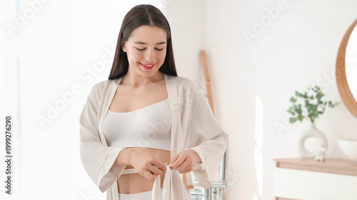 Happy young woman in stylis...