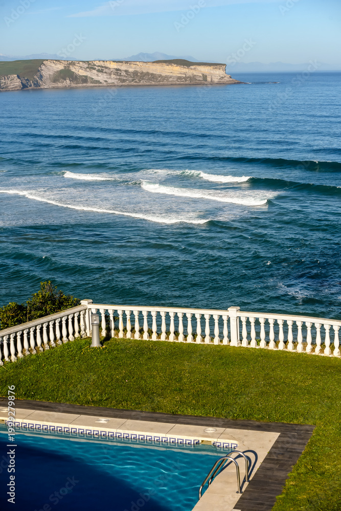 Obraz premium Villa or hotel with pool on the magnificent Cantabrian coast