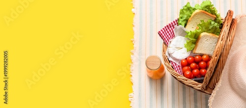 Wicker basket with tasty fo...